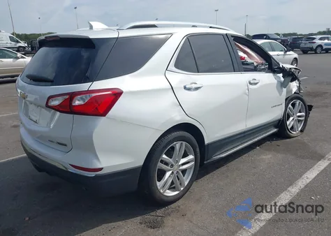 2018 Chevrolet Equinox Premier z USA, uszkodzony, nr VIN 2GNAXWEXXJ6323805